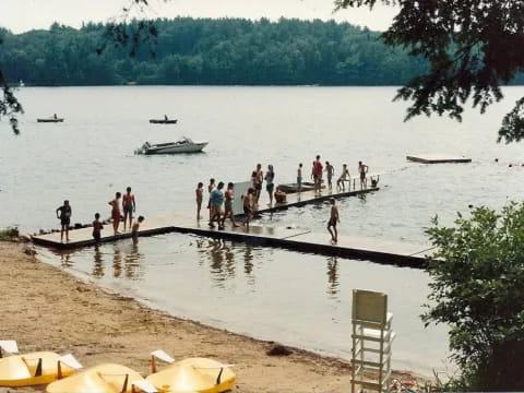 a group of people on a dock