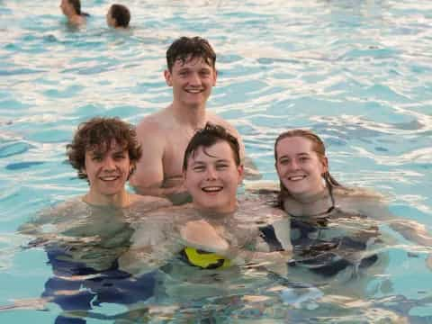 a group of people in a pool