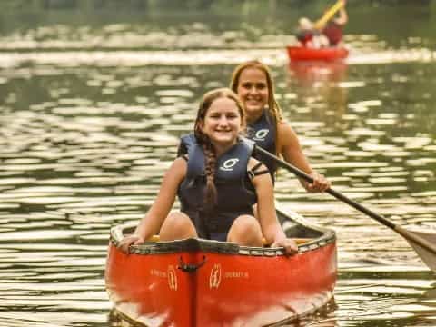 two girls in a canoe