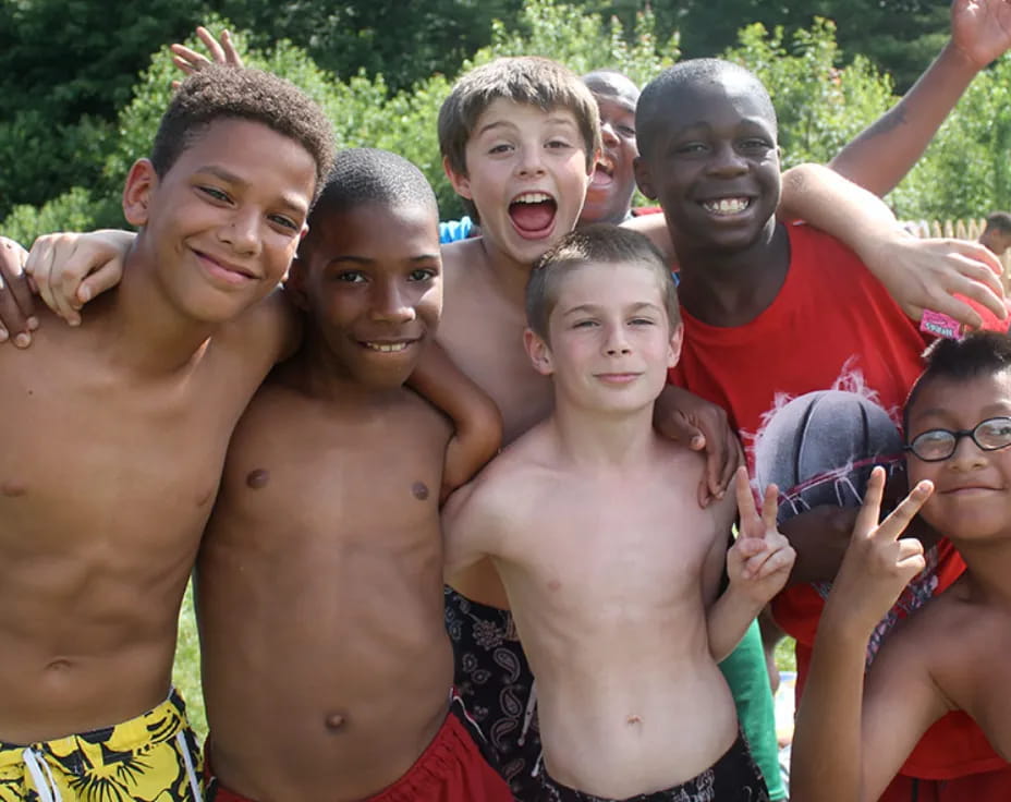 a group of people posing for the camera