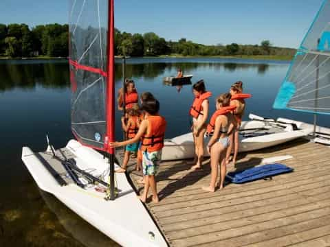 a group of people on a dock