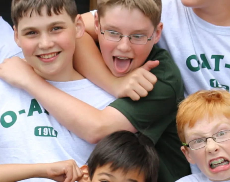 a group of boys posing for a photo