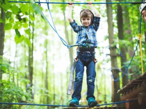 a boy on a zip line