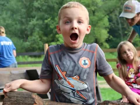 a boy with his mouth open