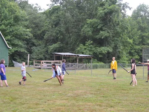 a group of people playing a game of hockey