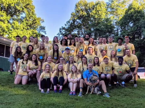 a group of people posing for a photo