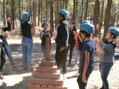 a group of people wearing helmets