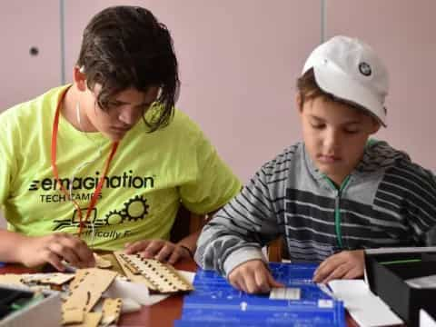 a few young people working on a project