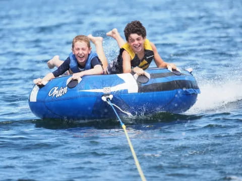two boys in a raft