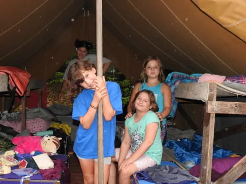 a group of people in a tent