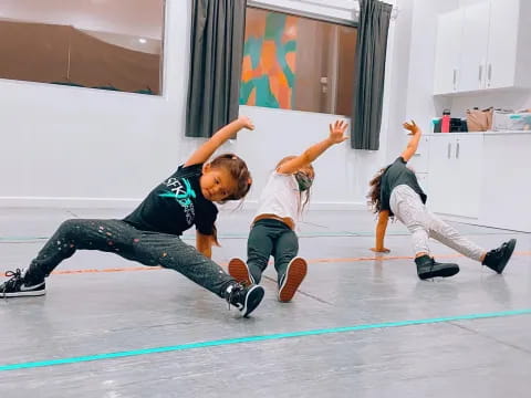 a group of kids in a gym