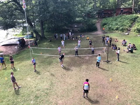 a group of people playing football