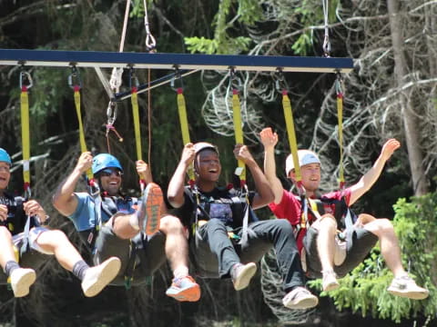 a group of people on a swing
