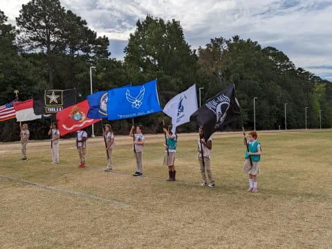 a group of people holding flags