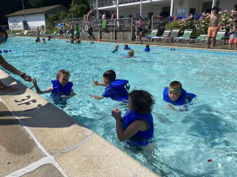 a group of people in a pool