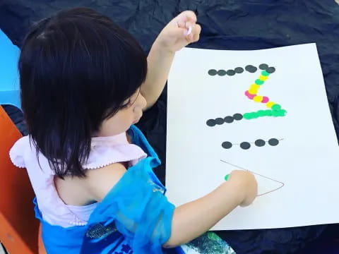 a child painting a picture