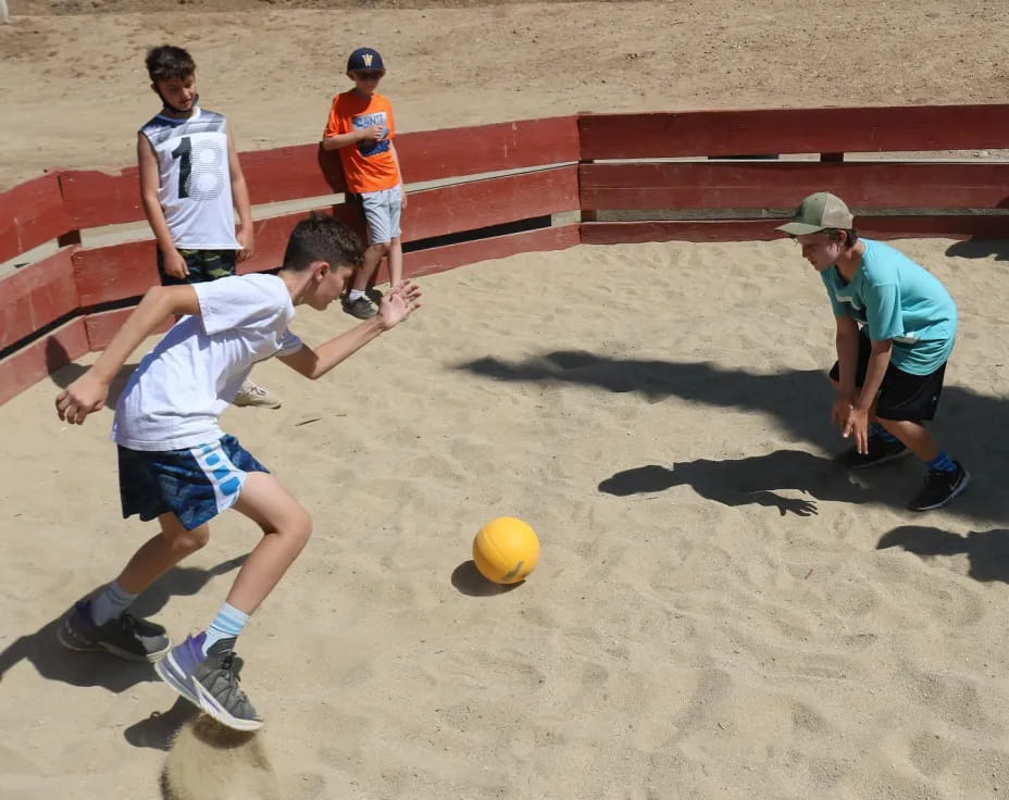 a group of boys playing football