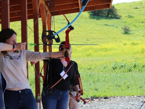 a person holding a bow and arrow