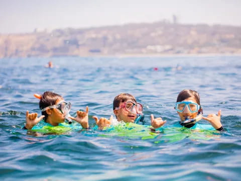 a group of people in the water