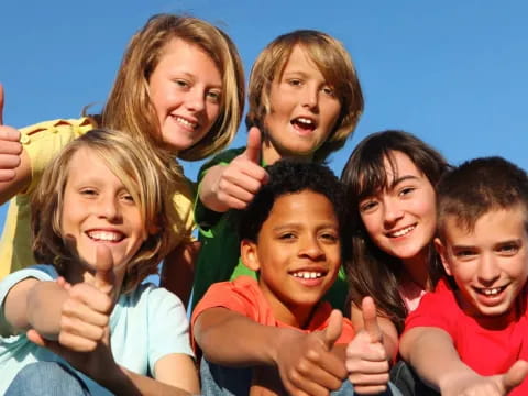 a group of people posing for a photo