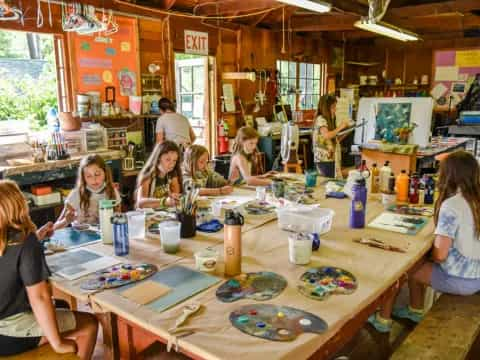 a group of people painting