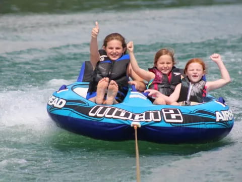 a group of kids on a raft