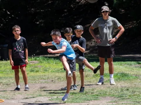 a group of people playing with a ball