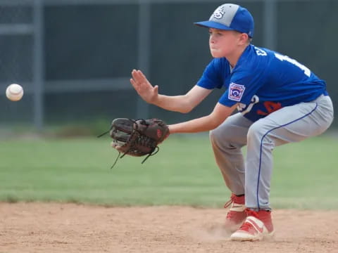 a baseball player throwing a baseball