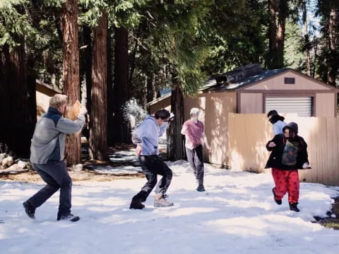 a group of people snowboarding