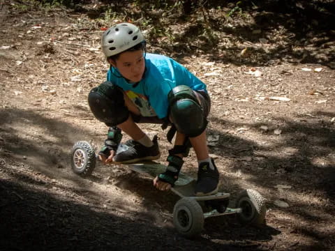 a boy riding a skateboard