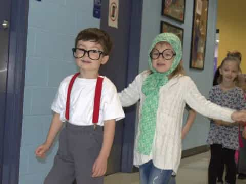 a group of children wearing clothing