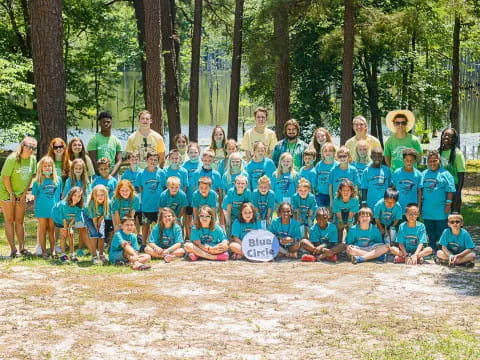 a group of people posing for a photo