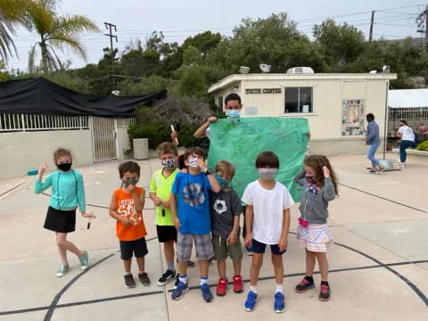 a group of children posing for a photo