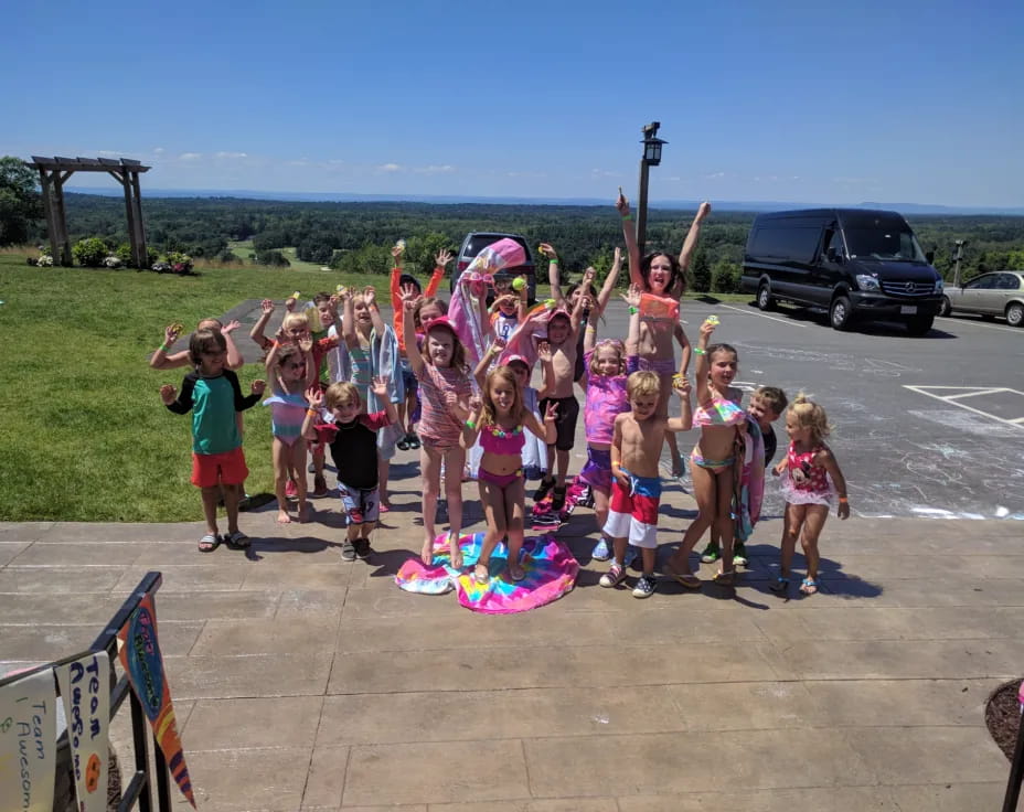 a group of children posing for a photo