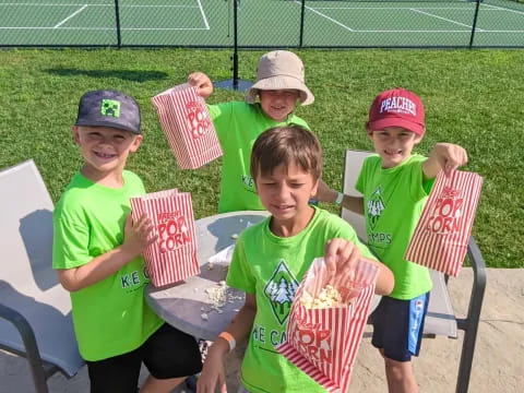 a group of boys holding flags