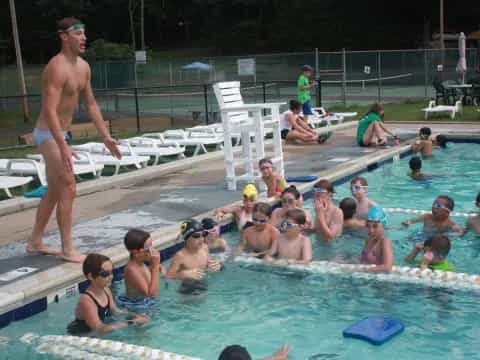 a group of people in a pool