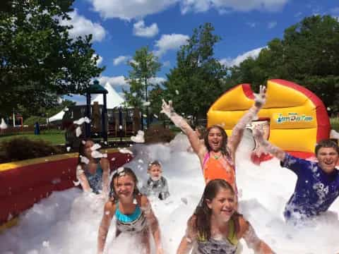 a group of people in a water park