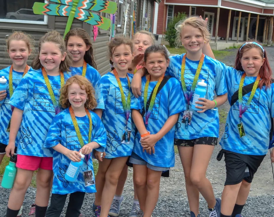 a group of girls wearing medals