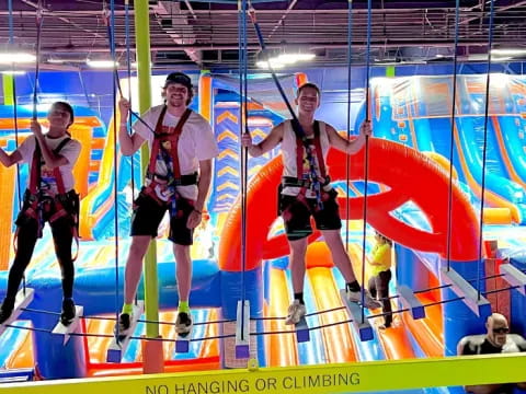 a group of men in a roller coaster