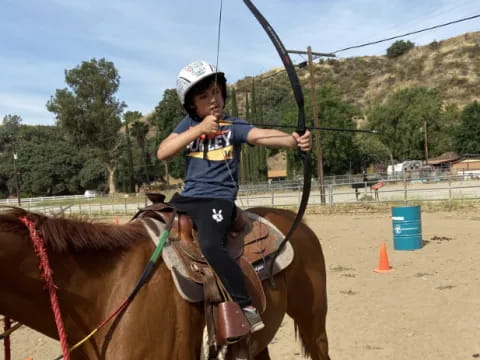 a girl riding a horse