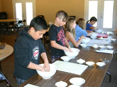 a group of people eating at a table