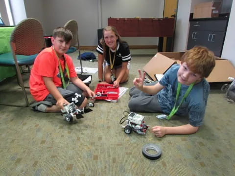 a group of kids playing with toys