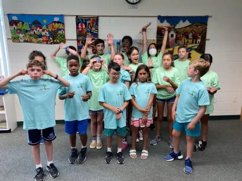 a group of children posing for a photo