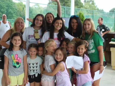 a group of girls posing for a photo