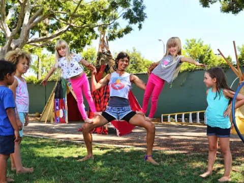 a group of children jumping in the air