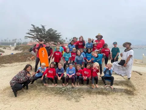 a group of people posing for a photo