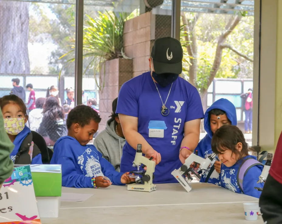 a person and a group of children