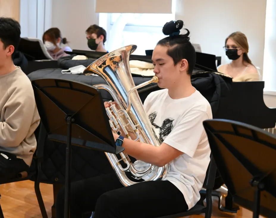 a group of people playing instruments