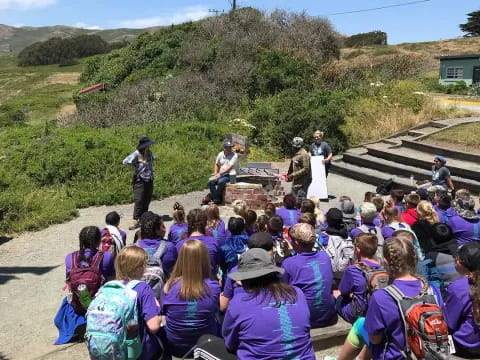 a group of people sitting on stairs