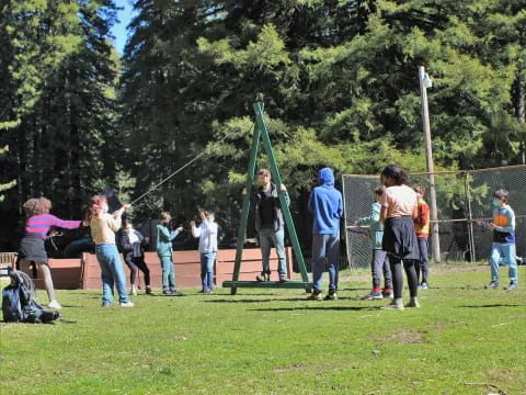 a group of people playing on a field